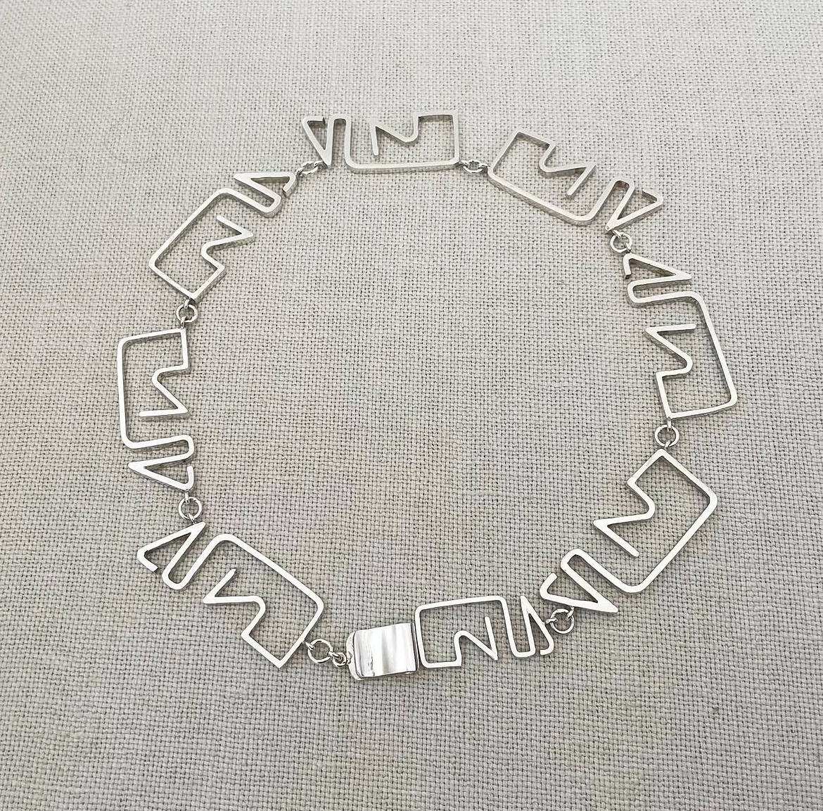 Puzzle neckalce