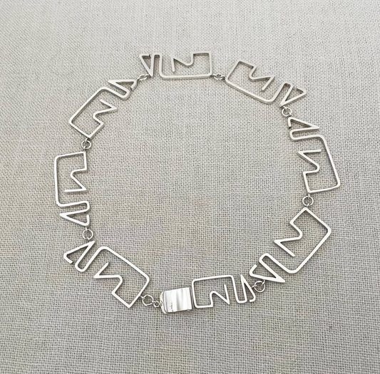 Puzzle neckalce